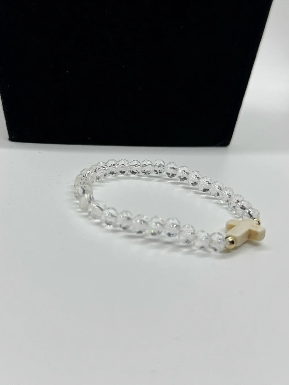 Clear Crystal Bead Stretch Bracelet with White Cross Accent